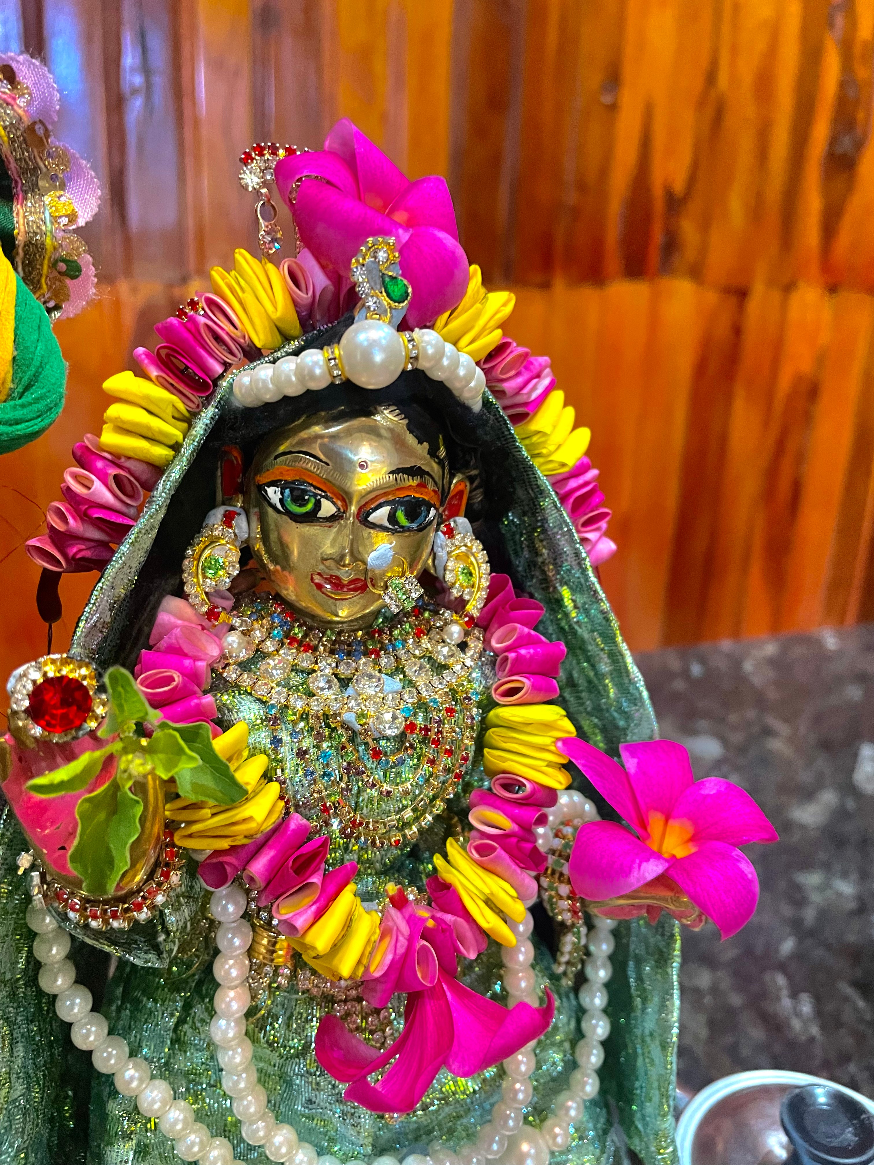 Close-up of the beautifully decorated deity of Srimati Radharani at ISKCON Kumasi